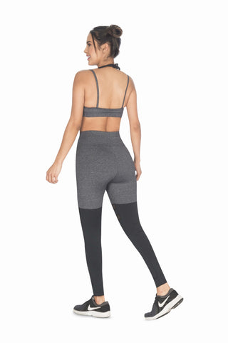 Grey high-waisted leggings with black mesh including tummy control technology