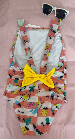 One-piece with stripe pattern and a bow at the back